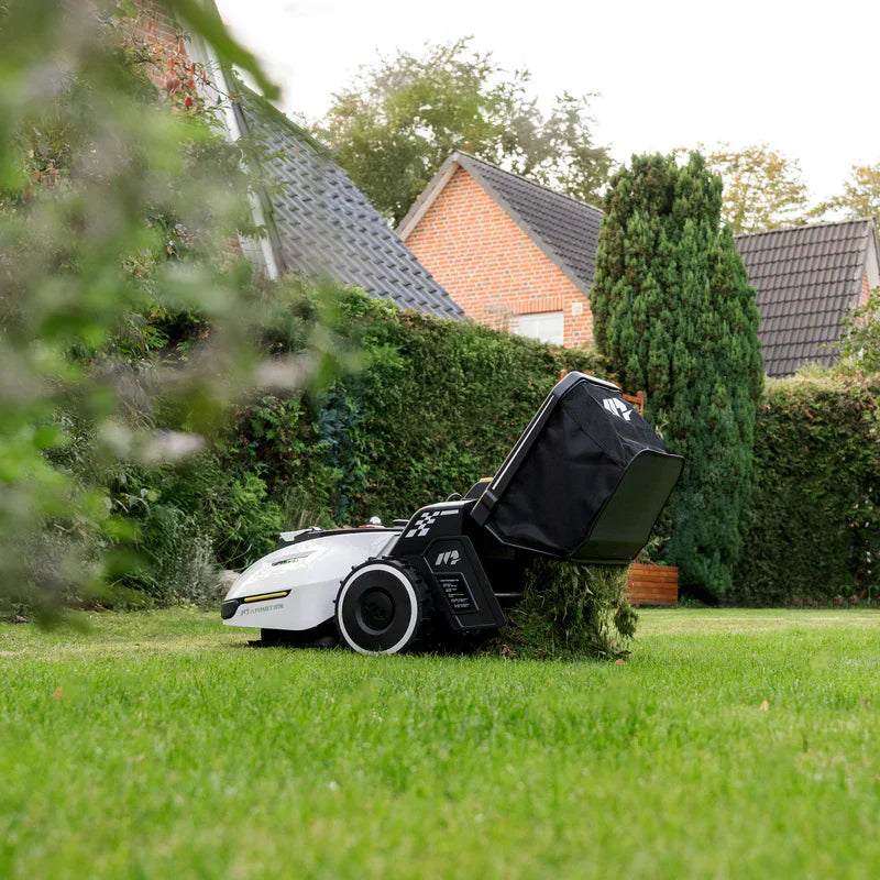 Mammotion Yuka 2000 automatic lawn mower on grass